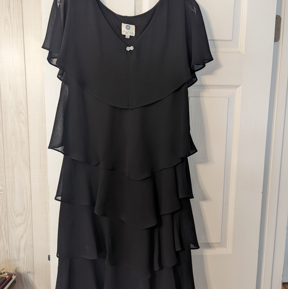 Pretty black cocktail dress, sheer sleeves, flowy bottom